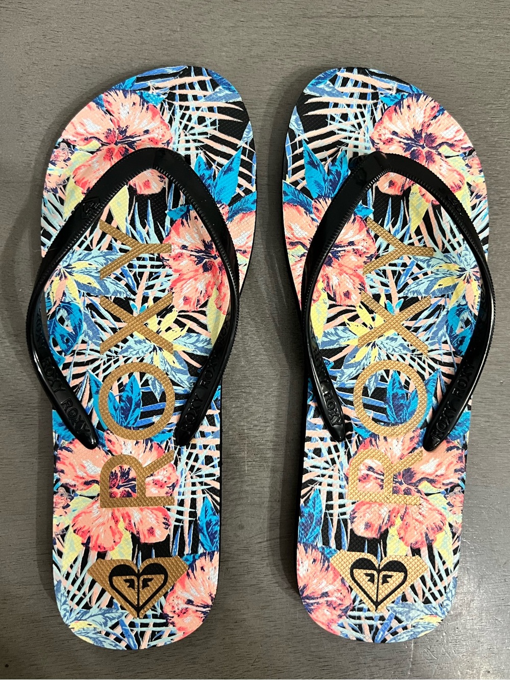 Roxy® tropical flip flops